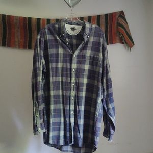 Long sleeve blue plaid shirt.